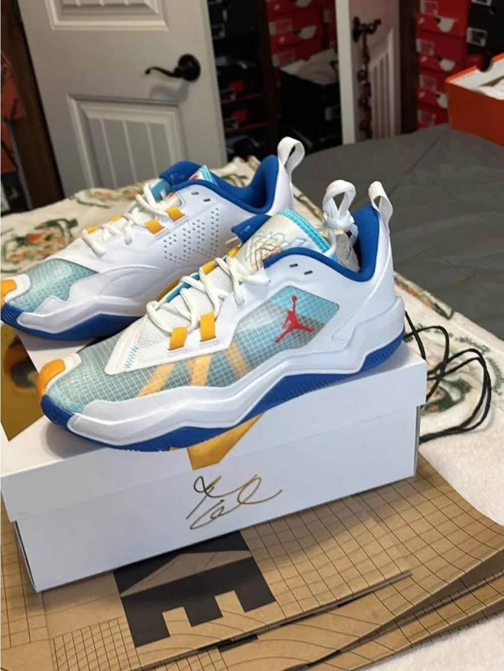 Air Jordan Low-Top Sneakers in White, Blue & Yellow